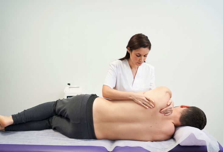 physiotherapist-treating-the-patient-s-shoulder-2023-11-27-05-06-33-utc physiotherapist-treating-the-patient-s-shoulder-2023-11-27-05-06-33-utc